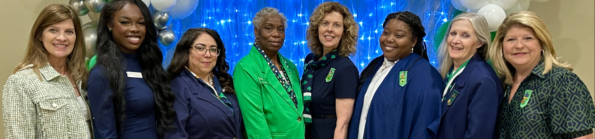  girl scout staff at annual meeting check-in table 