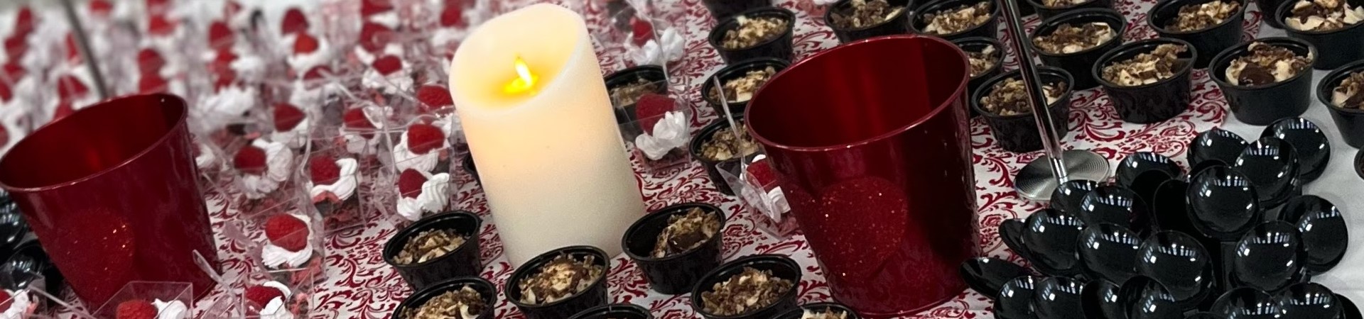  desserts and a candle on a table 